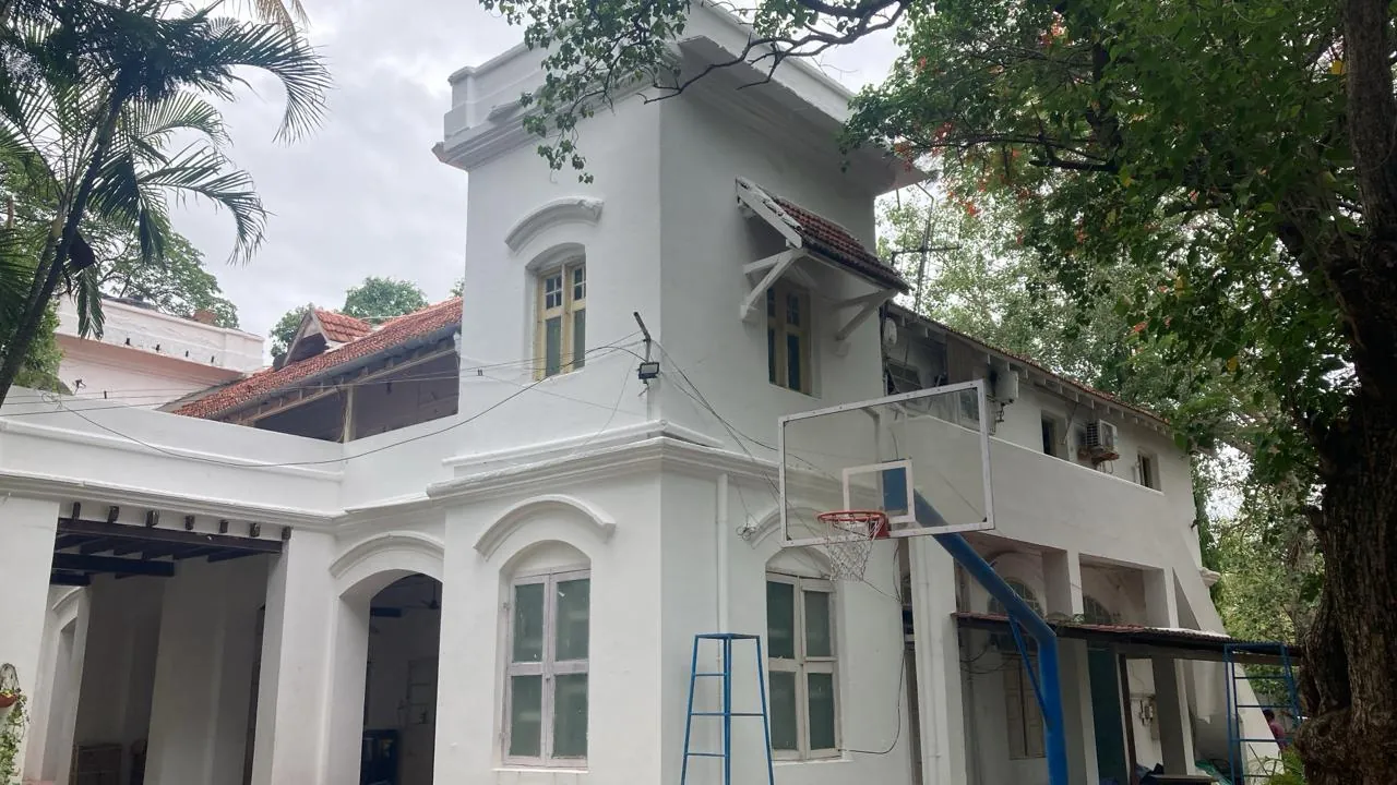 Institutional building exterior finished in bright white