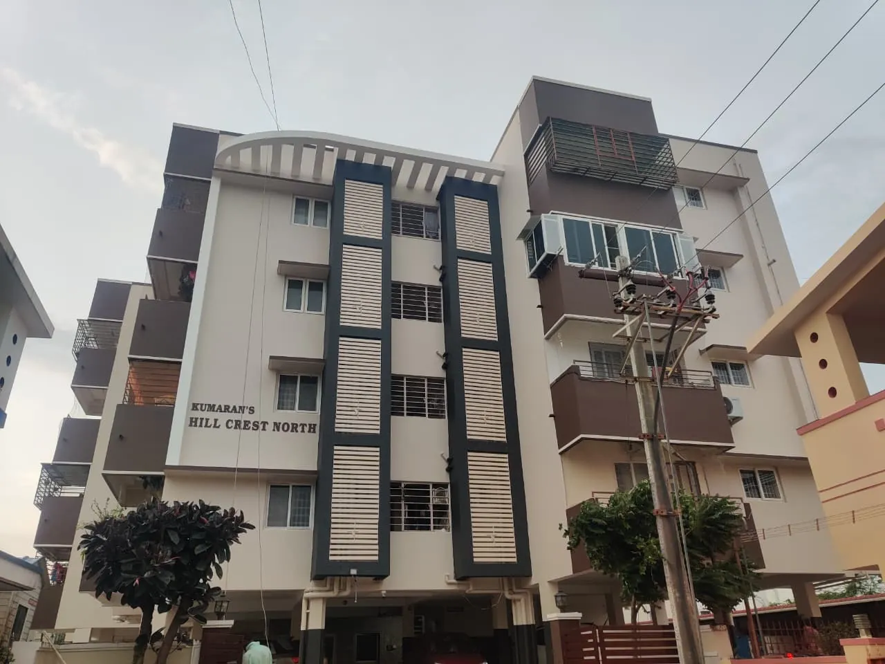 Multi-floor apartment block exterior after full repainting